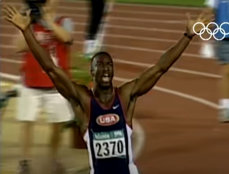 American sprinter Michael Johnson achieves a groundbreaking performance by breaking the 200-meter world record 